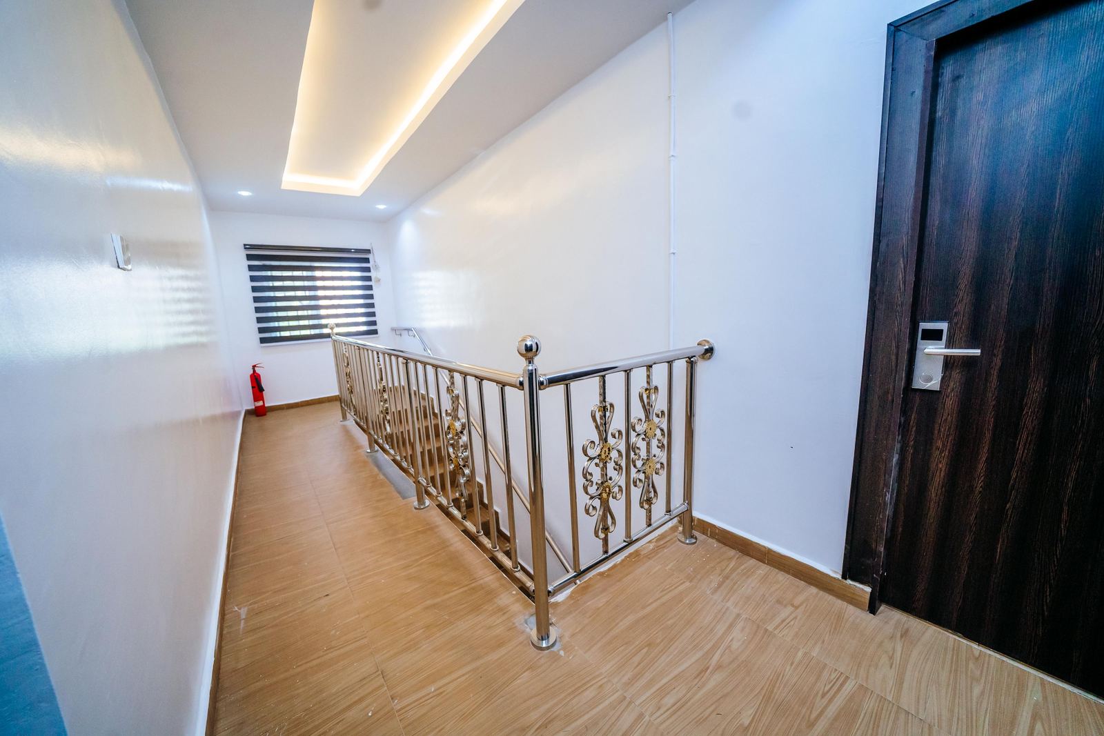 Hallway with cove lighting