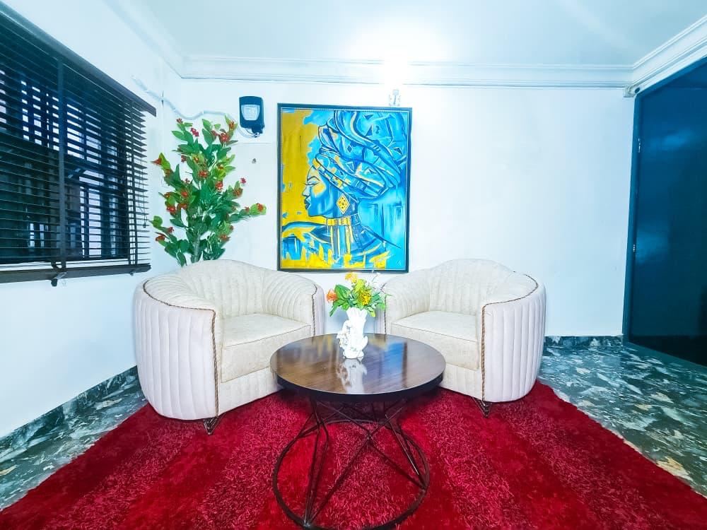 Guest lounge with local art at Tallin Luxury Hotel