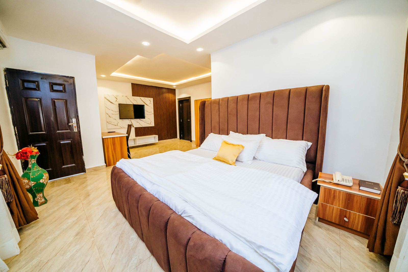 Renovated guest room with feature wall at Tallin Luxury Hotel