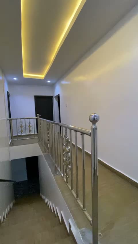 Video walkthrough of the staircase railing detail and hallway lighting